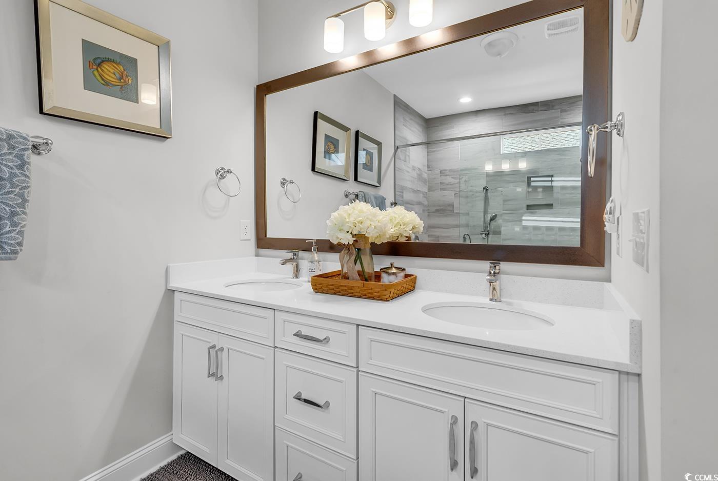 6024 Curran Street Murrells Inlet, SC 29576 - Photo 17 of 34 Full bath featuring double vanity and a stall shower