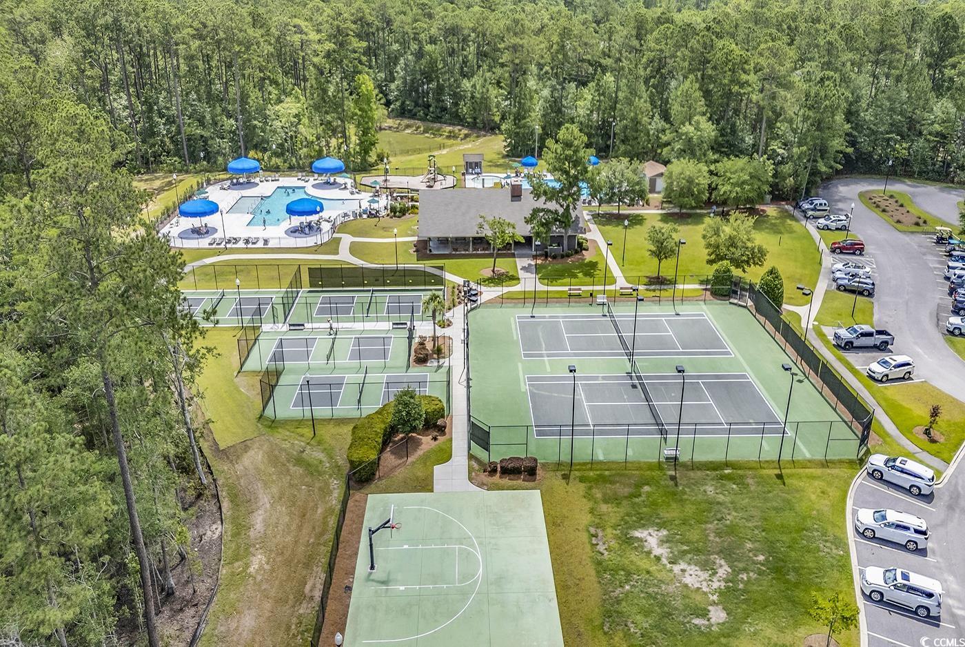 6024 Curran Street Murrells Inlet, SC 29576 - Photo 33 of 34 Aerial view of a heavily wooded area and a pool area
