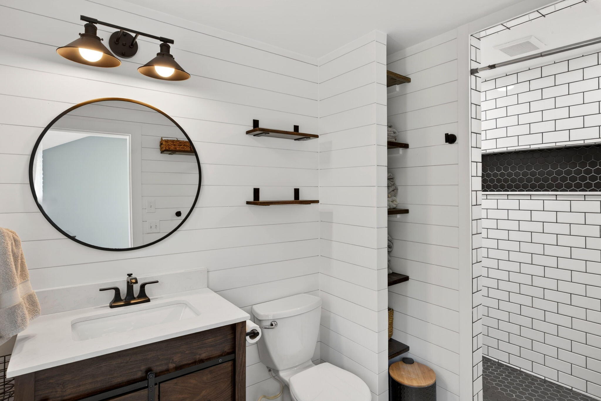 12 Sarah Lawrence Road Sandwich, MA 02563 - Photo 24 of 54 a bathroom with a sink a toilet and a mirror
