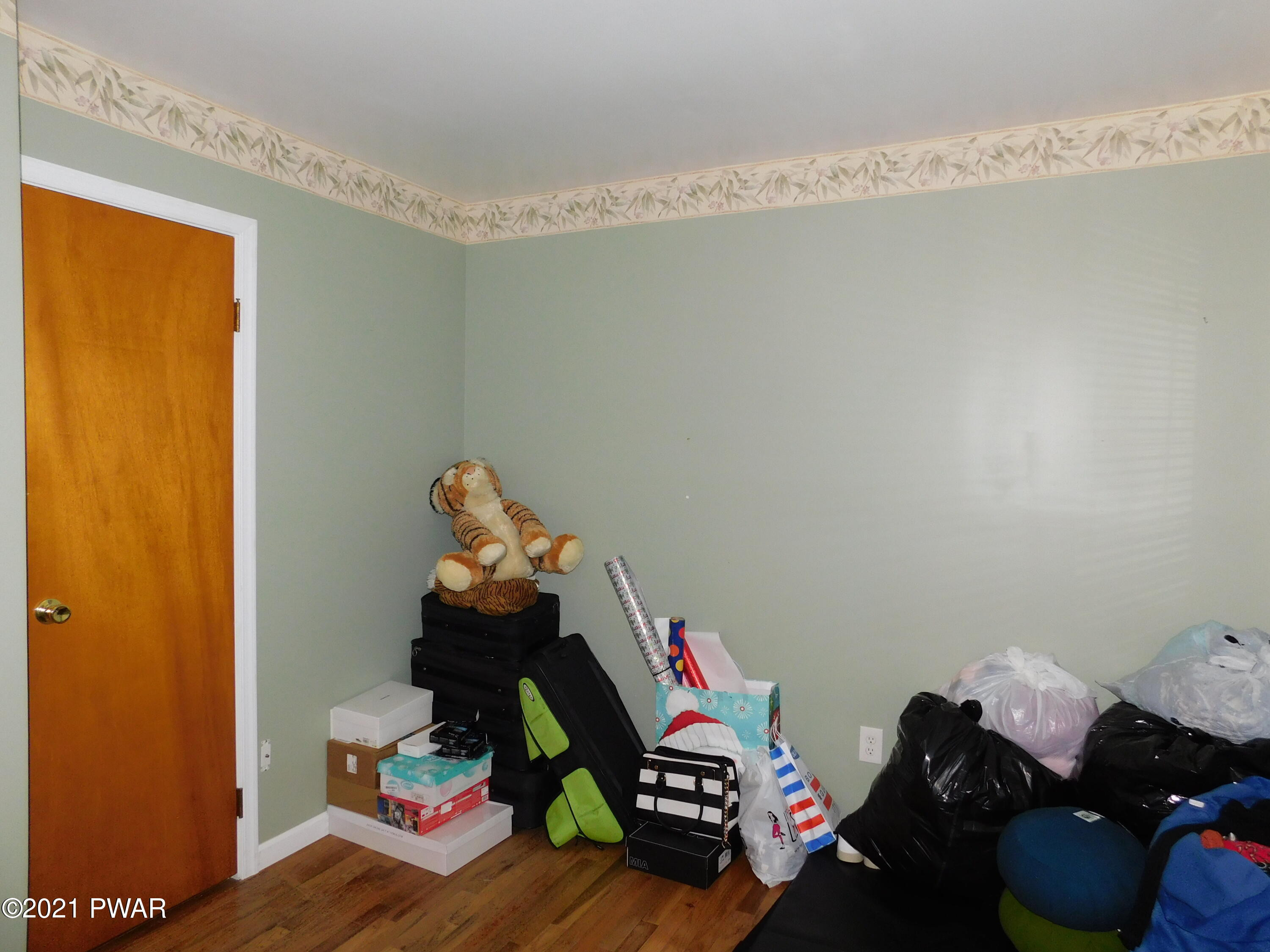 119 Ridge Drive Milford, PA 18337 - Photo 28 of 40 a room with toys and wooden floor