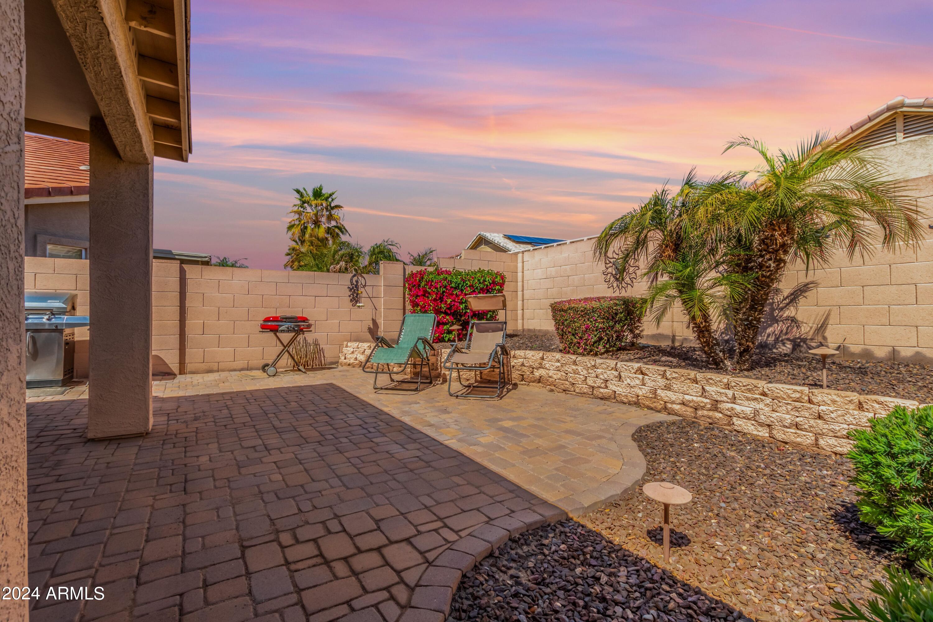 15730 West Calavar Road Surprise, AZ 85379 - Photo 3 of 57 Calavar Patio Twilight 2
