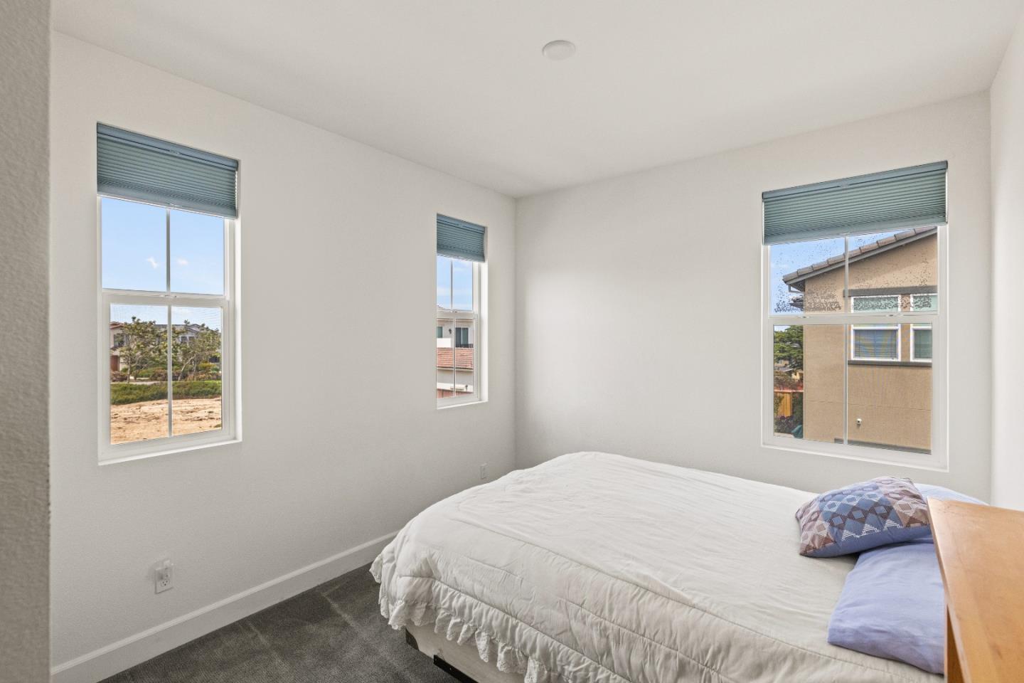 579 Rosa Monte Way Marina, CA 93933 - Photo 16 of 37 a bedroom with a bed and a window