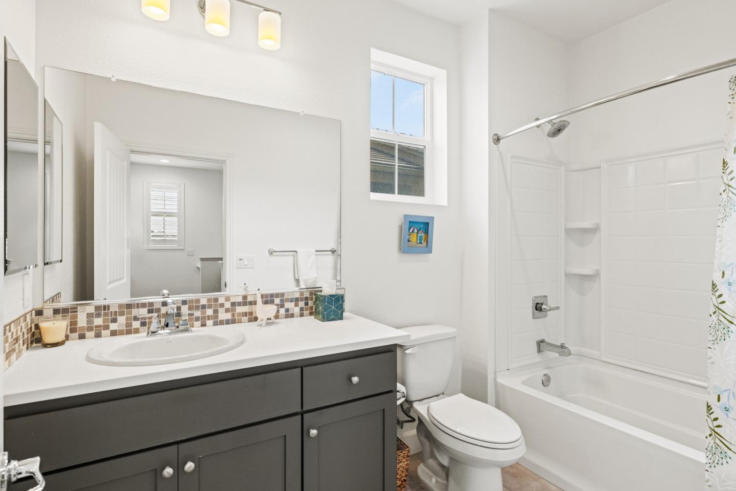 579 Rosa Monte Way Marina, CA 93933 - Photo 18 of 37 a bathroom with a sink a toilet and shower