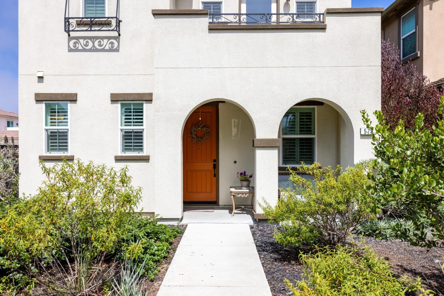 579 Rosa Monte Way Marina, CA 93933 - Photo 3 of 37 a front view of a house with garden