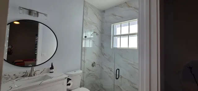 a utility room with a sink washer and dryer
