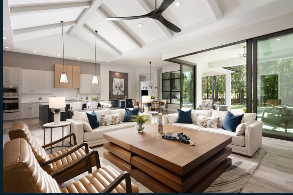 1024 Bear Paw Ridge Dahlonega, GA 30533 - Photo 2 of 55 a living room with furniture a ceiling fan and a chandelier