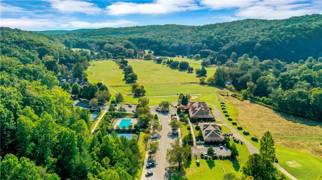 1024 Bear Paw Ridge Dahlonega, GA 30533 - Photo 23 of 55 a view of a swimming pool with a yard