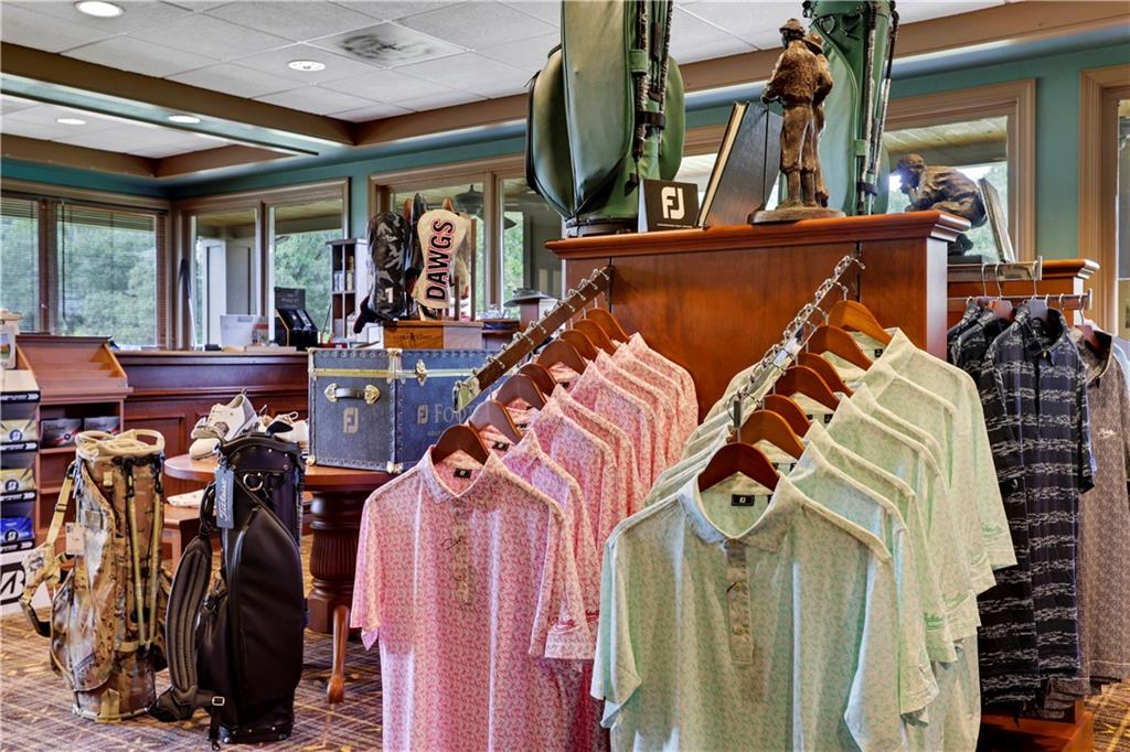 1024 Bear Paw Ridge Dahlonega, GA 30533 - Photo 32 of 55 a view of walk in closet with clothes and shoes