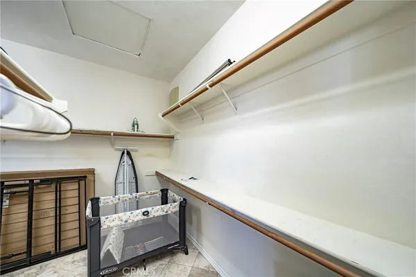 a bedroom with a bed and a table