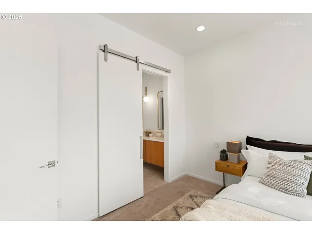 a bathroom with a sink double vanity shower and a mirror