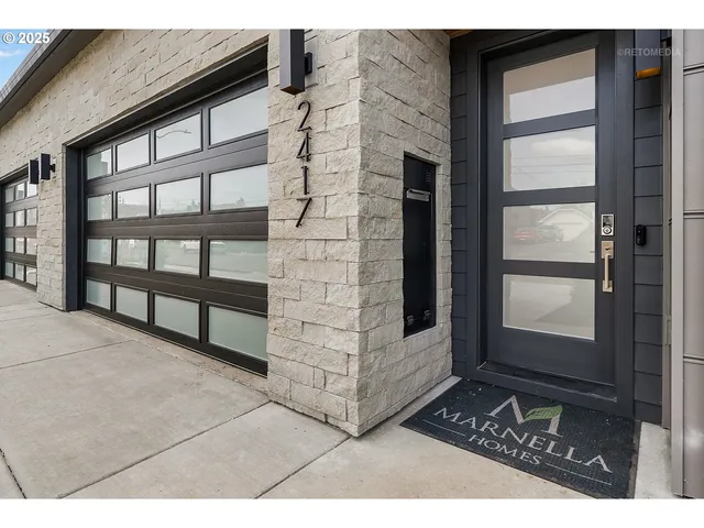 a bathroom with a sink a mirror and a shower
