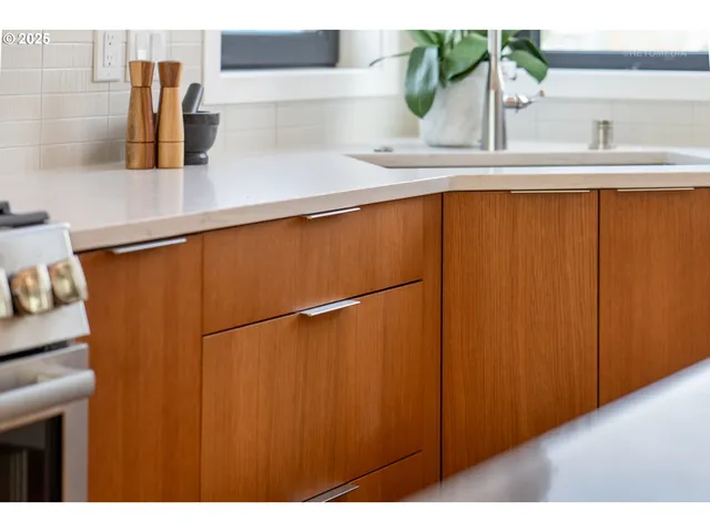 a bathroom with a shower and a sink