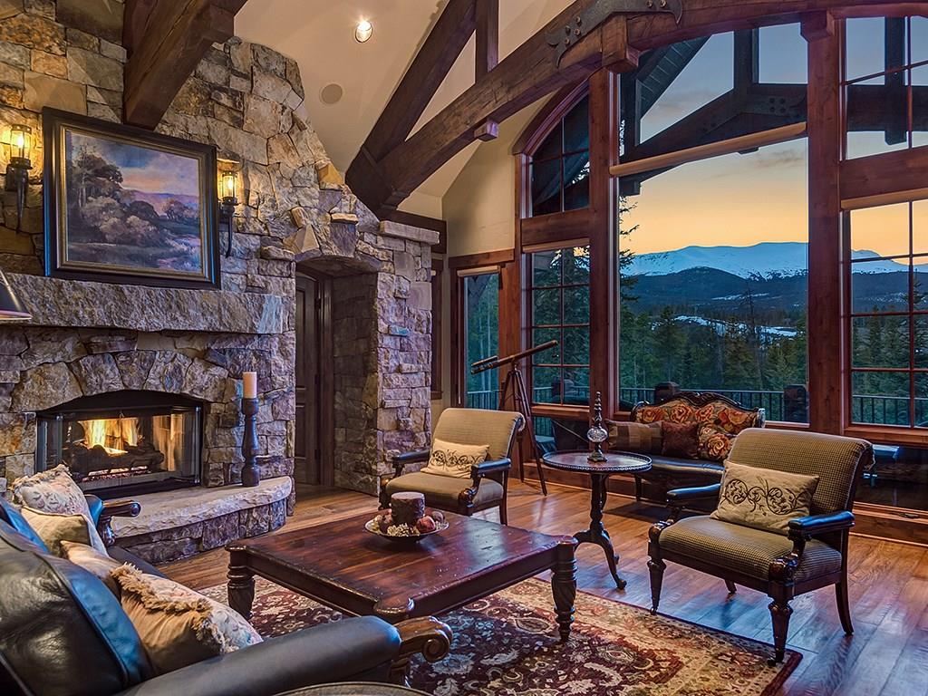 462 Peerless Drive Breckenridge, CO 80424 - Photo 2 of 25 a living room with furniture and a fireplace