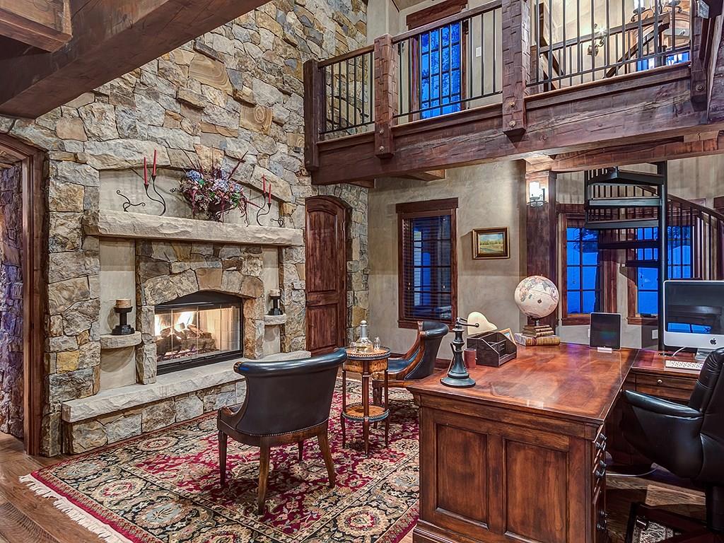 462 Peerless Drive Breckenridge, CO 80424 - Photo 12 of 25 a living room with fireplace furniture and a rug