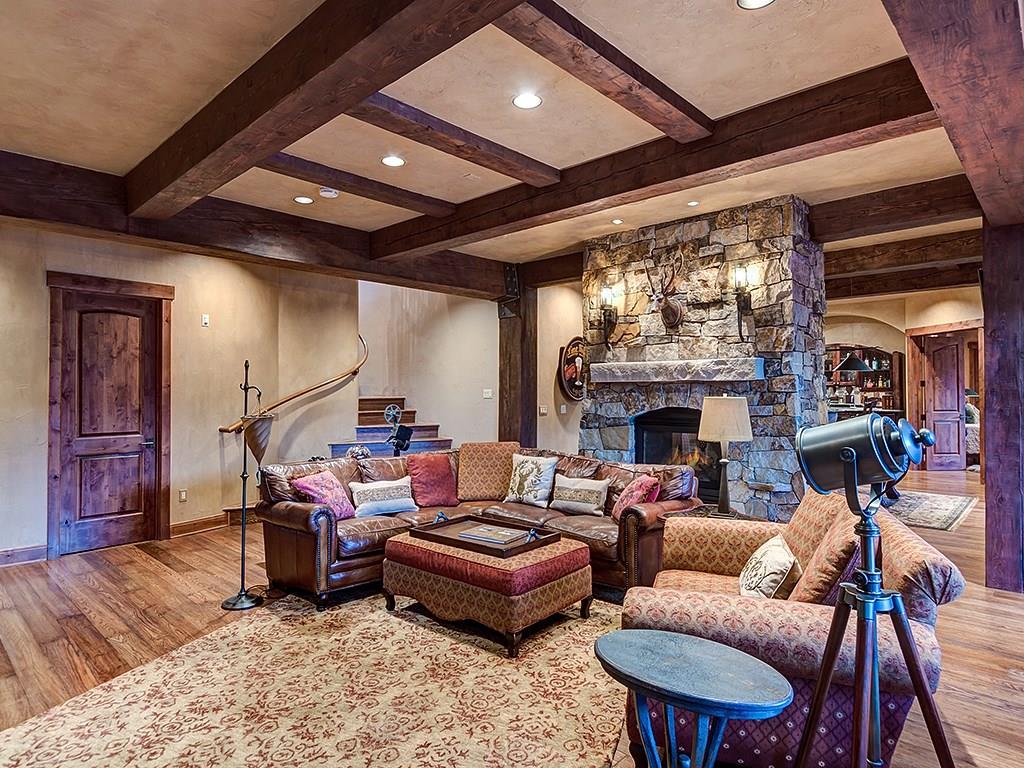 462 Peerless Drive Breckenridge, CO 80424 - Photo 16 of 25 a living room with furniture a fireplace and a table