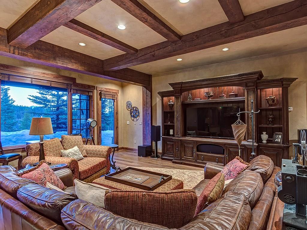 462 Peerless Drive Breckenridge, CO 80424 - Photo 17 of 25 a living room with furniture and a flat screen tv