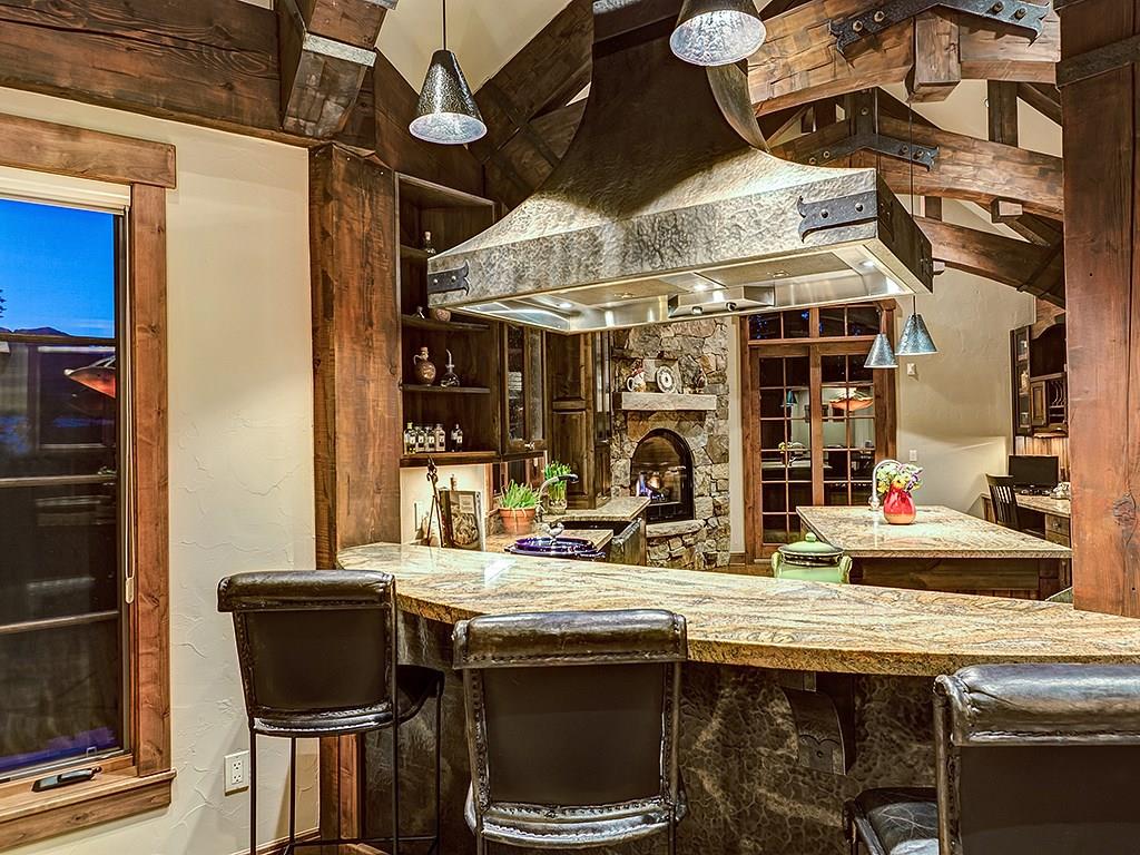 462 Peerless Drive Breckenridge, CO 80424 - Photo 8 of 25 a room with stainless steel appliances granite countertop a sink and a stove