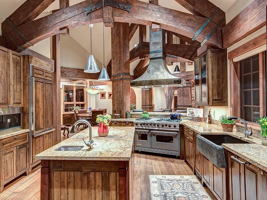 462 Peerless Drive Breckenridge, CO 80424 - Photo 9 of 25 a kitchen with stainless steel appliances granite countertop a stove and a sink