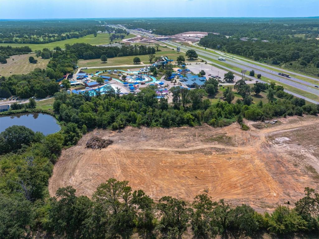 Lot 5 Interstate 20 Lexington, SC 29072 - Photo 4 of 6 an aerial view of lake residential house with outdoor space and trees all around
