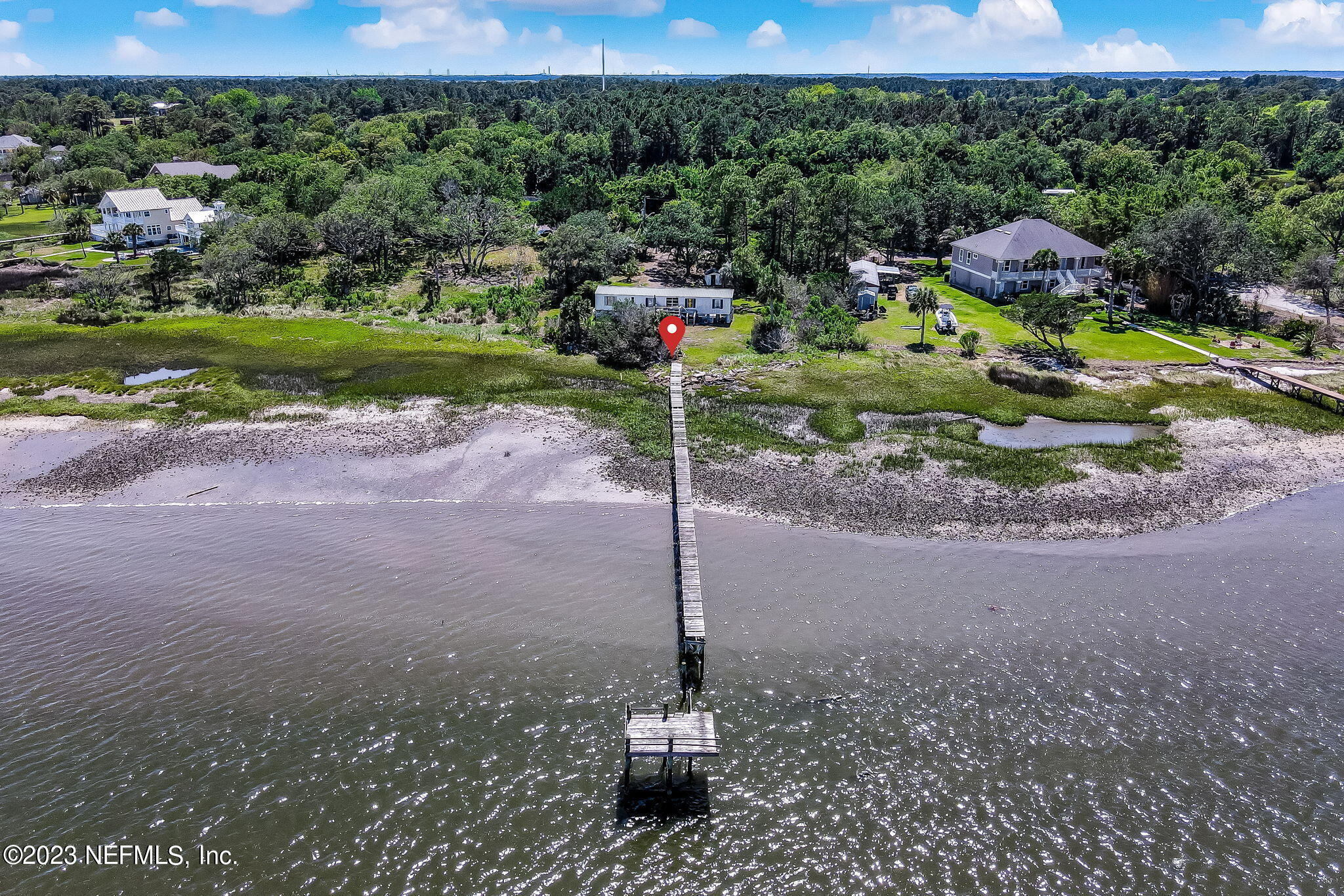 16225 Shellcracker Road Jacksonville, FL 32226 - Photo 14 of 18 a garden view with a swimming pool