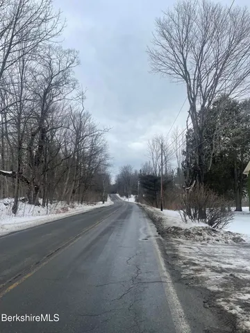 a kitchen with a stove and cabinets