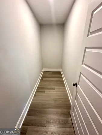 wooden floor with staircase