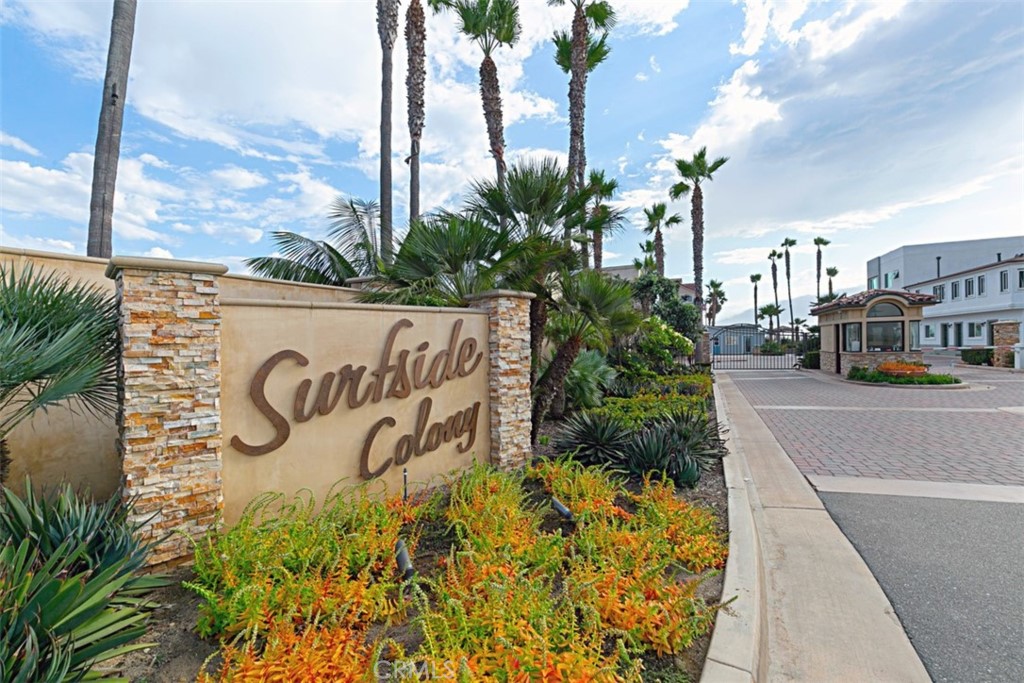 94 A Surfside Seal Beach, CA 90740 - Photo 21 of 33 a sign on the side of a building