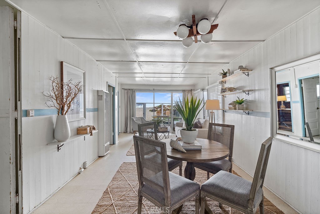 94 A Surfside Seal Beach, CA 90740 - Photo 5 of 33 a view of a dining room with furniture window and outside view