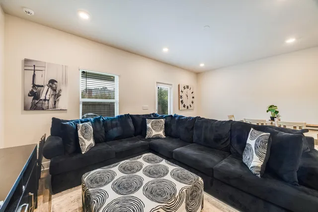 a living room with furniture and a couch