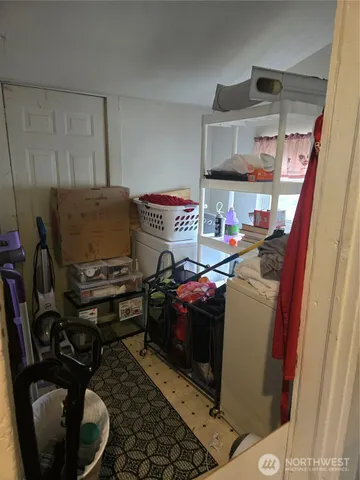 a kitchen with sink refrigerator and stove