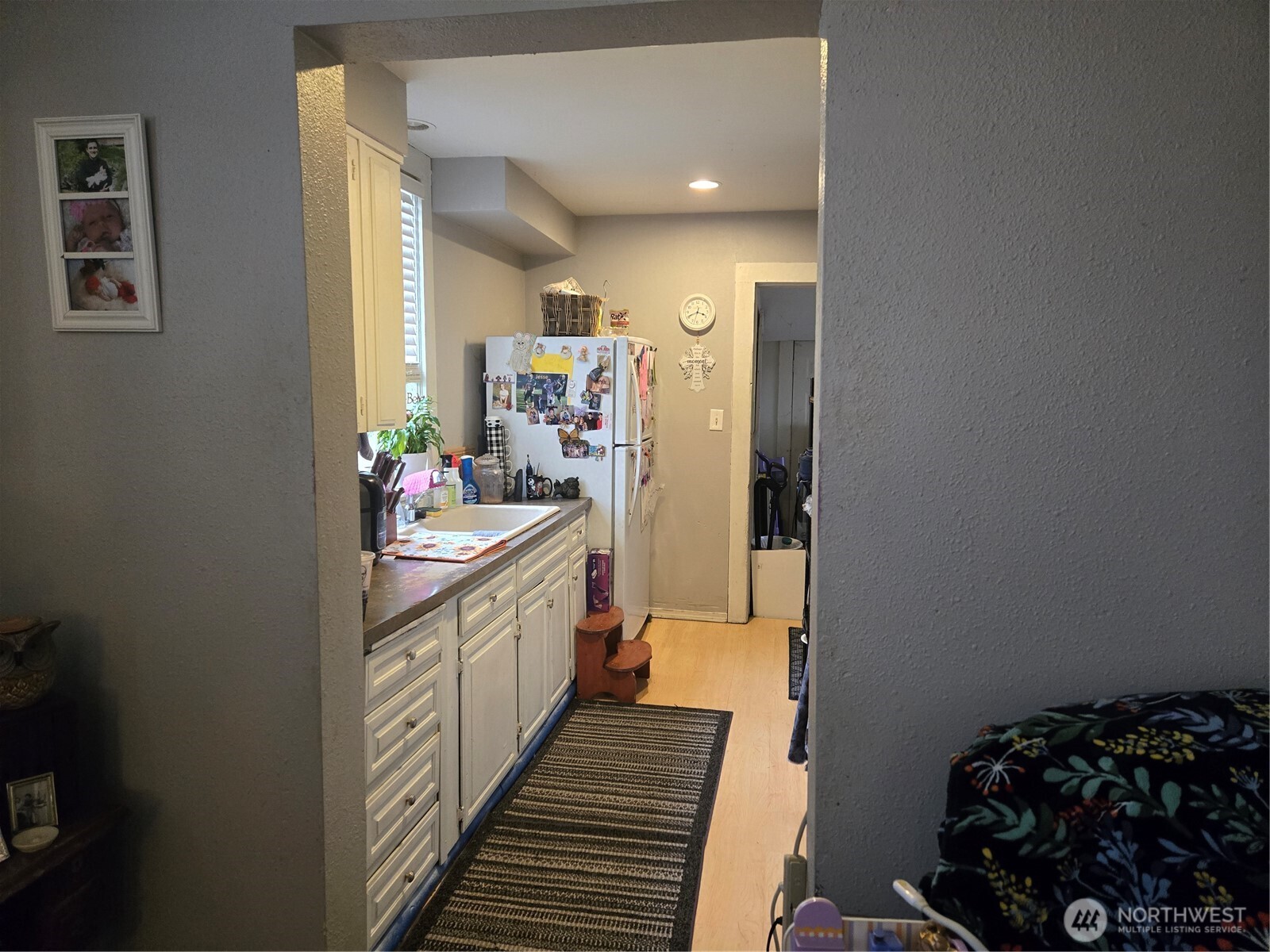7610 Union Mills Road Southeast Lacey, WA 98503 - Photo 23 of 25 a kitchen with sink cabinets and stove
