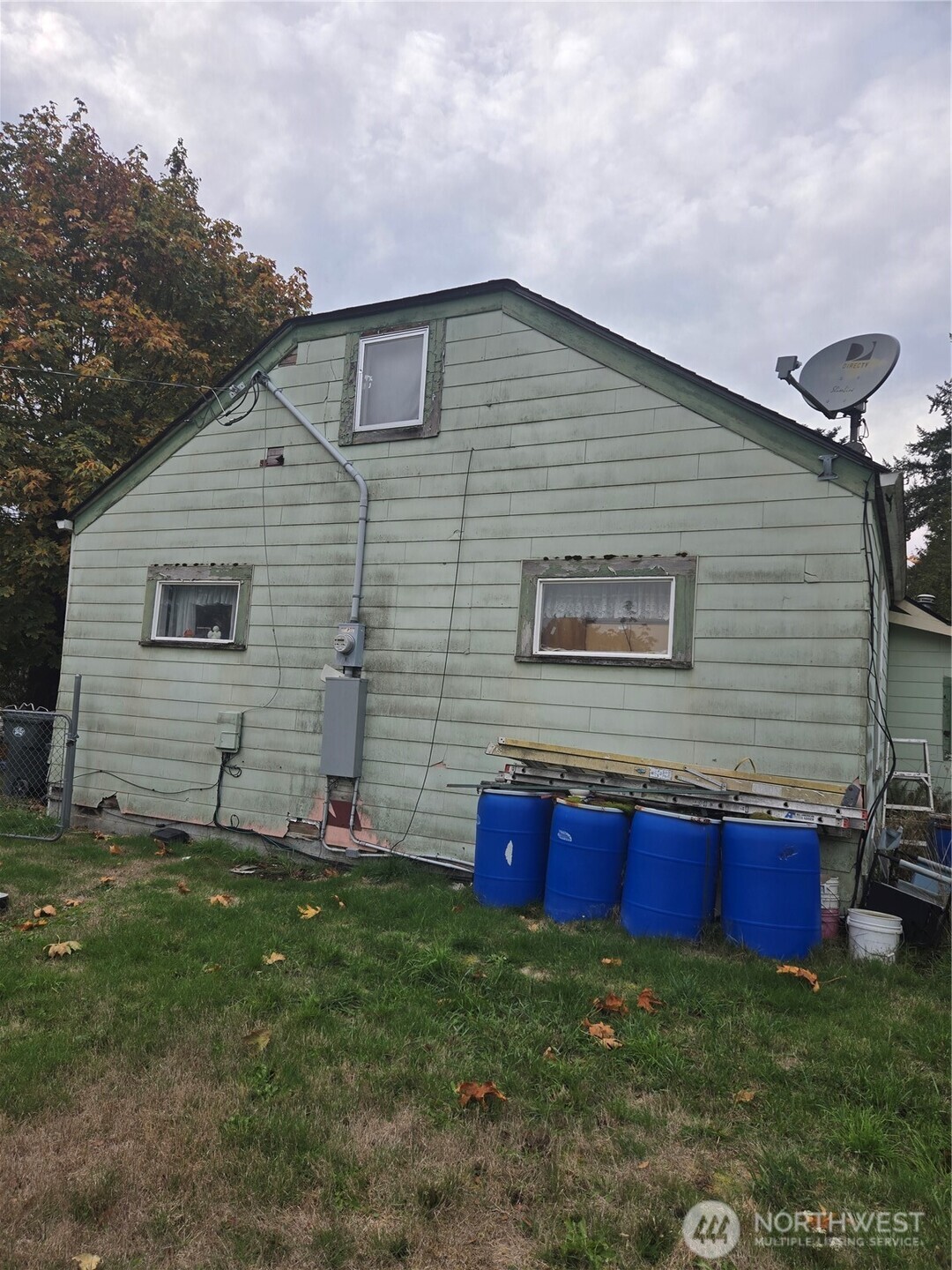 7610 Union Mills Road Southeast Lacey, WA 98503 - Photo 5 of 25 a view of front of a house with a yard