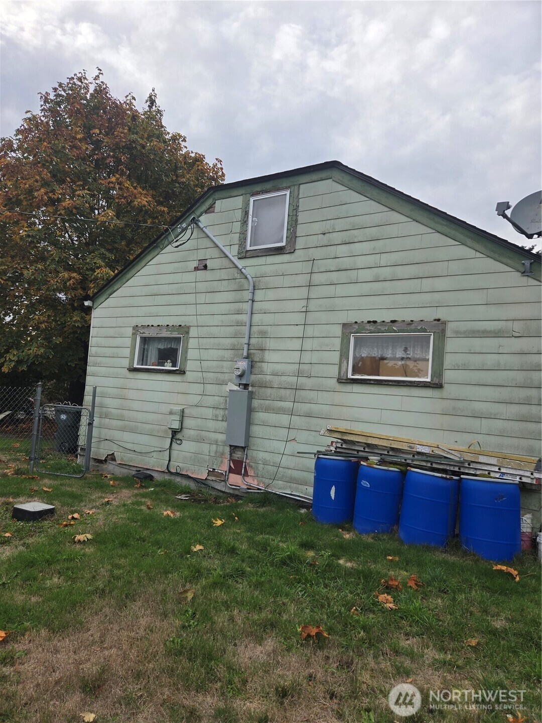7610 Union Mills Road Southeast Lacey, WA 98503 - Photo 6 of 25 a view of front of a house with a yard