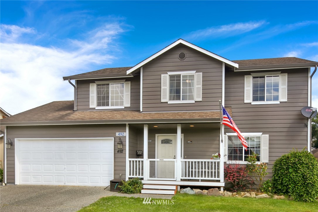 492 Spring Lane Sedro-Woolley, WA 98284 - Photo 40 of 40 a front view of a house with a yard