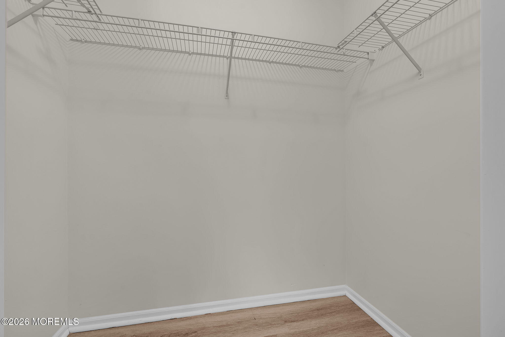 12 High Pointe Way Matawan, NJ 07747 - Photo 28 of 31 a view of a room with racks on the wall
