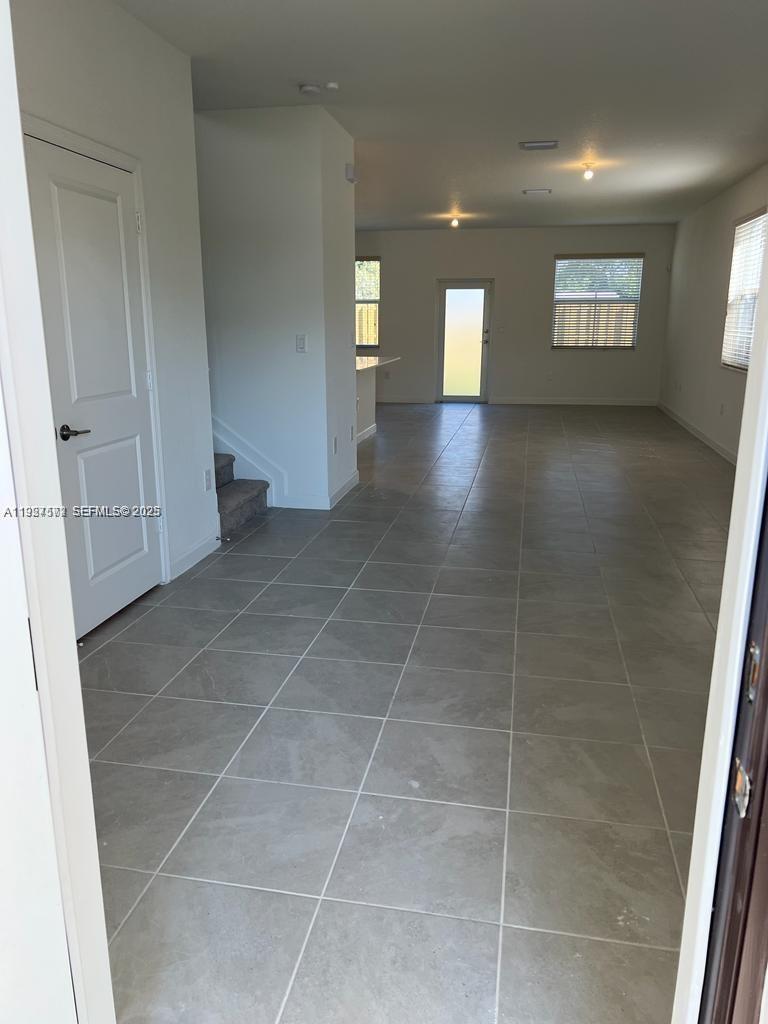 2281 Northwest 131st Circle Miami, FL 33167 - Photo 11 of 48 a view of an empty room and window