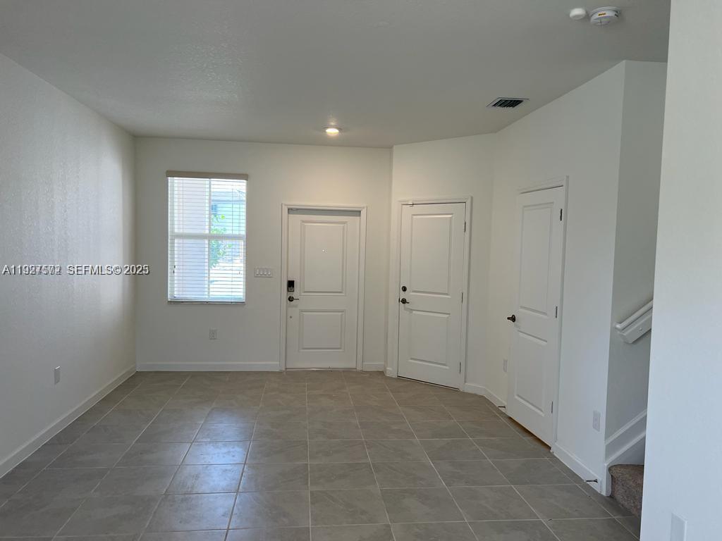 2281 Northwest 131st Circle Miami, FL 33167 - Photo 13 of 48 a view of an empty room