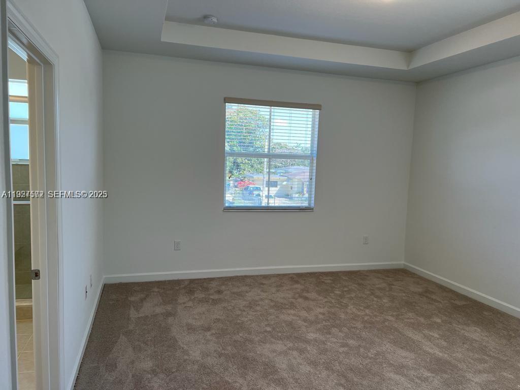 2281 Northwest 131st Circle Miami, FL 33167 - Photo 18 of 48 an empty room with a window