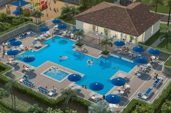 an aerial view of a house with pool patio and outdoor seating