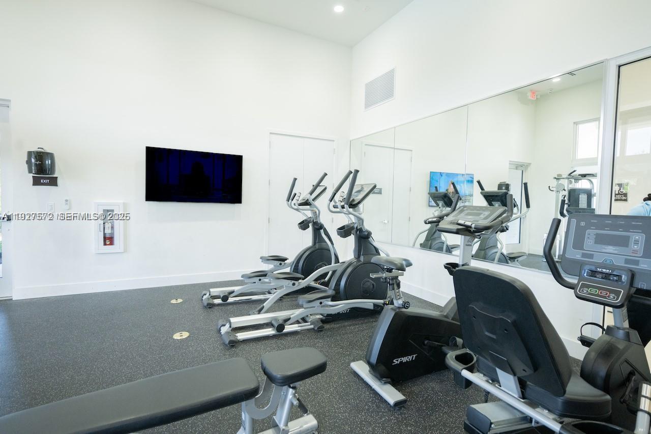 2281 Northwest 131st Circle Miami, FL 33167 - Photo 46 of 48 a view of a room with gym equipment
