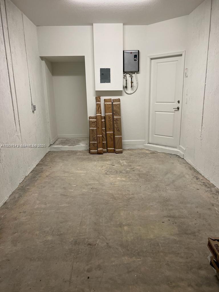 2281 Northwest 131st Circle Miami, FL 33167 - Photo 9 of 48 an empty room with closet and mirror