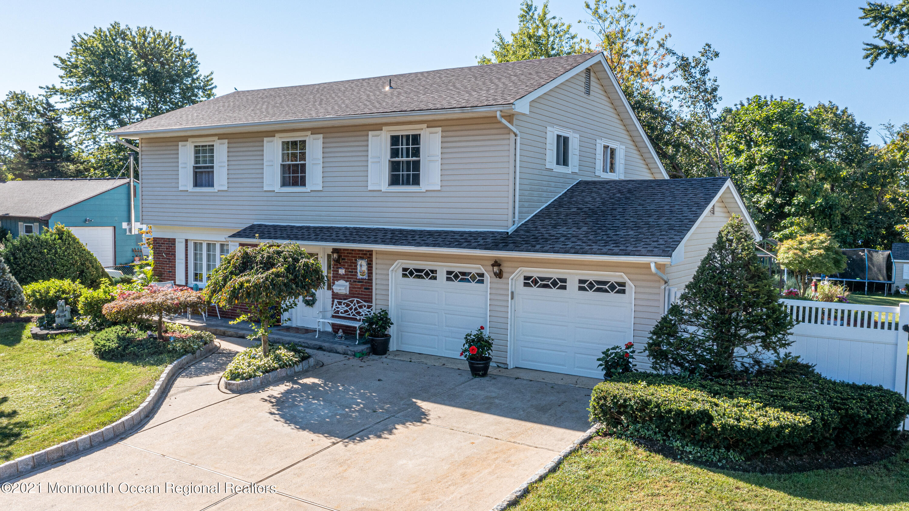 7 Westbrook Road Howell, NJ 07731 - Photo 1 of 32 a front view of a house with garden