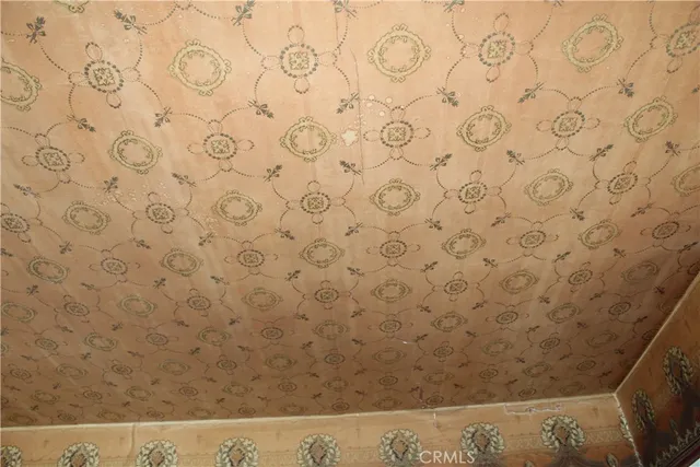 a view of a couches in backyard of house