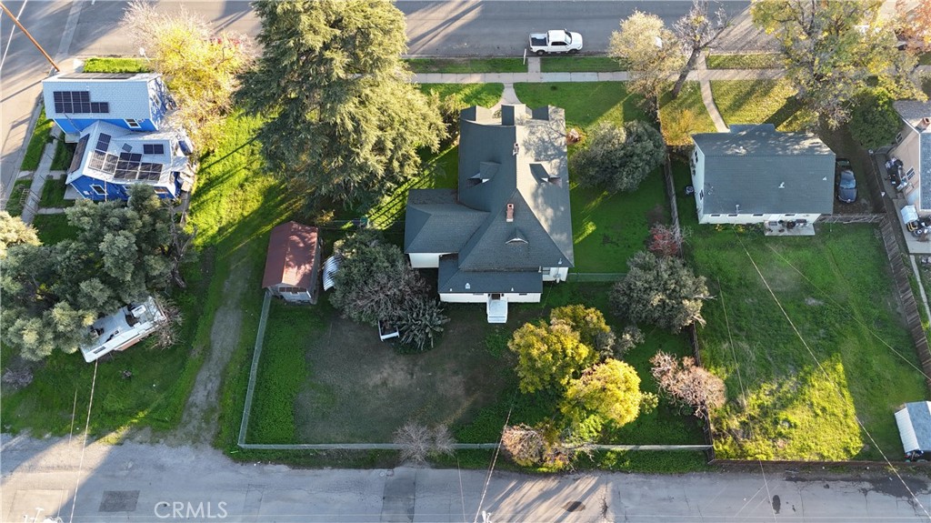 1414 Marin Street Corning, CA 96021 - Photo 5 of 71 an aerial view of multiple houses with yard