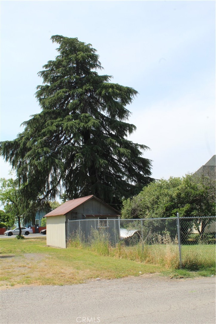1414 Marin Street Corning, CA 96021 - Photo 70 of 71 a swimming pool with outdoor seating and yard