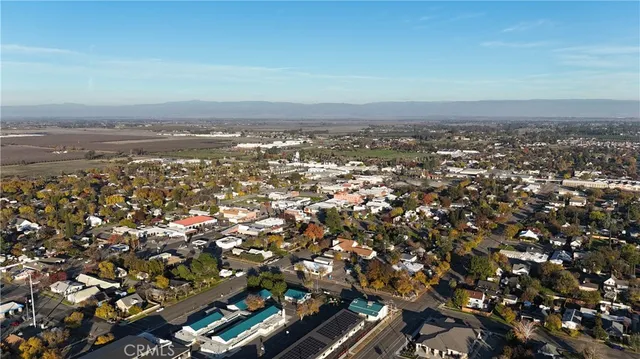 a view of kitchen appliances and chandelier