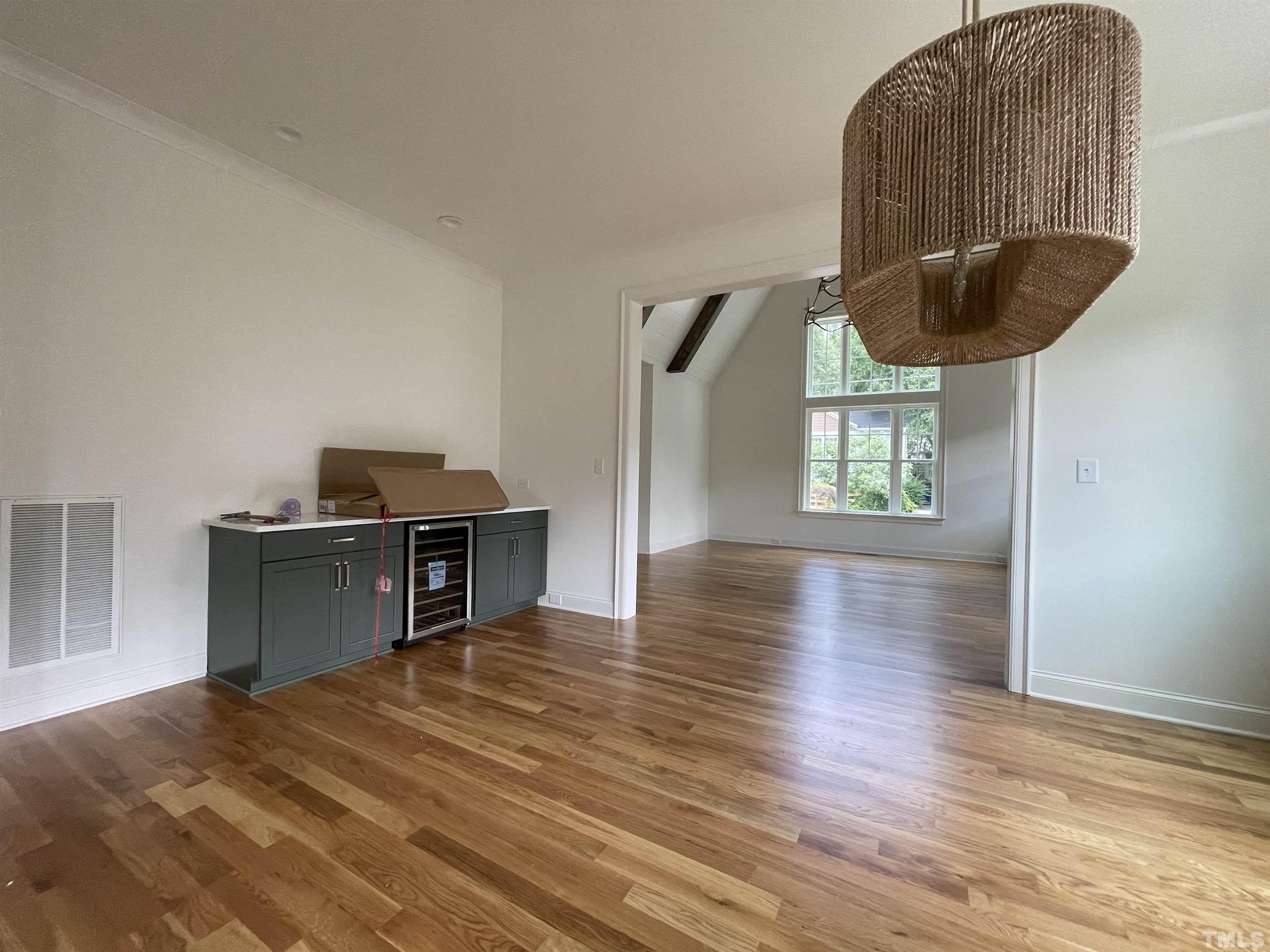 400 Pershing Road Raleigh, NC 27608 - Photo 15 of 33 a room with furniture and a wooden floor