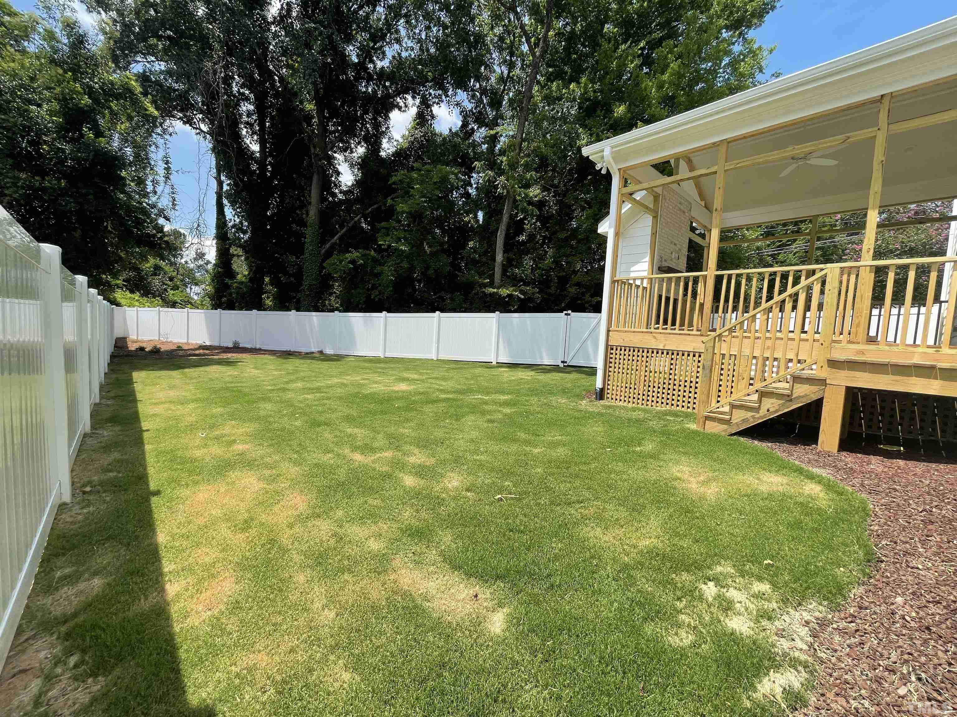 400 Pershing Road Raleigh, NC 27608 - Photo 8 of 33 a view of a swimming pool with deck and a garden