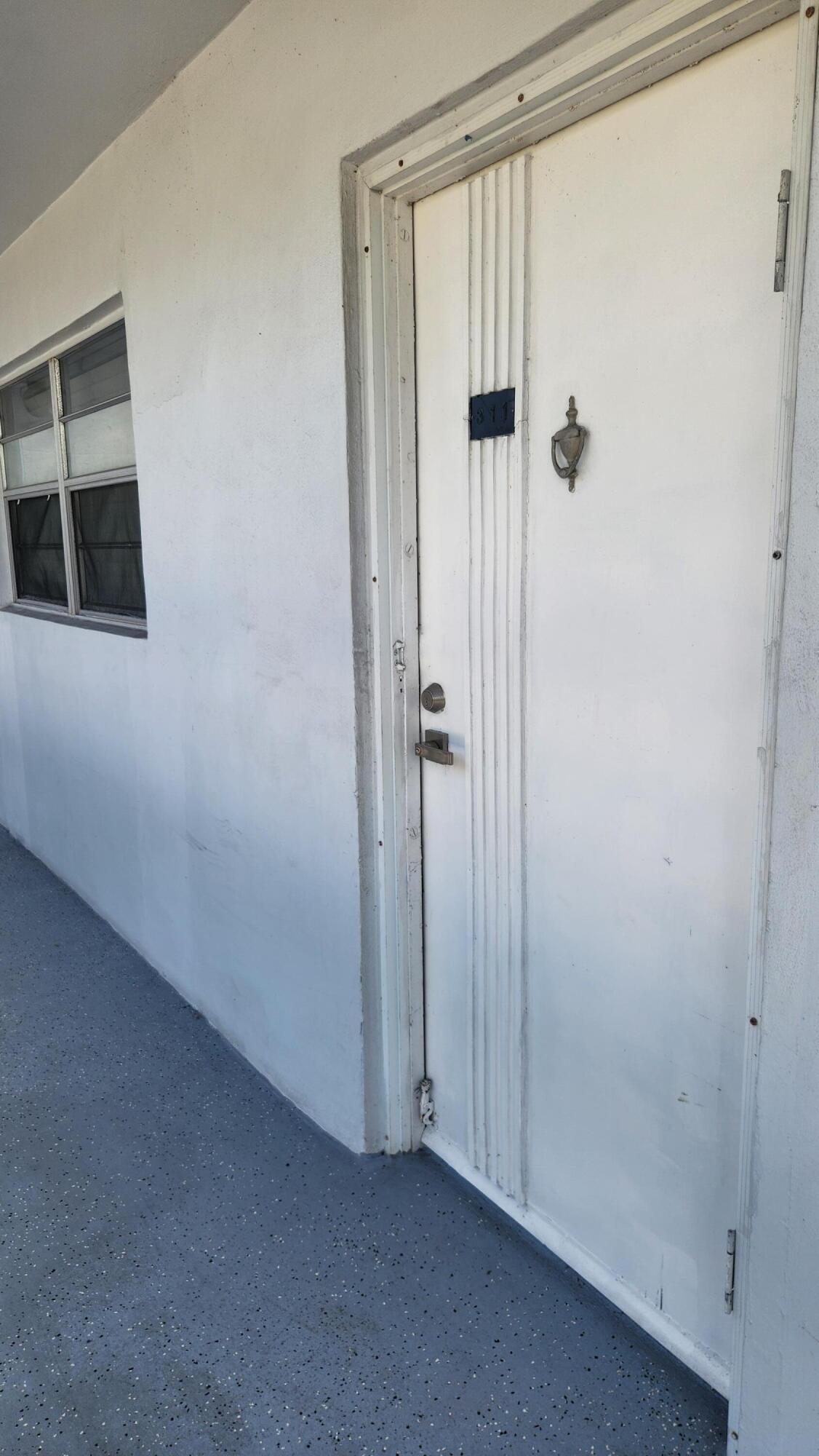 6500 Northwest 2nd Avenue, Unit 311 Boca Raton, FL 33487 - Photo 13 of 43 Front door