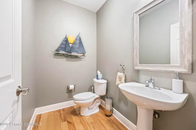 a spacious bedroom with a bed and a window